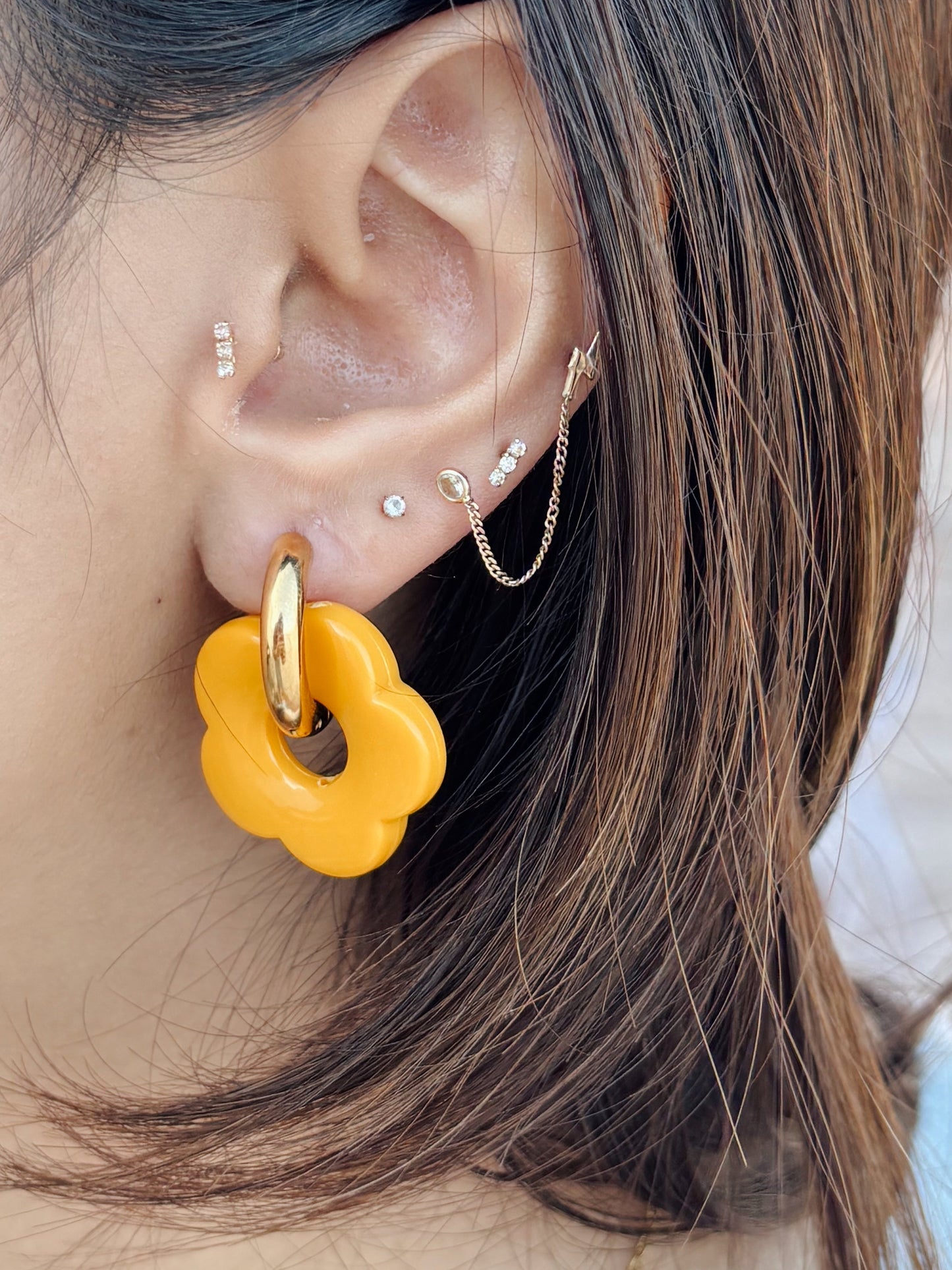 Aretes flor naranja