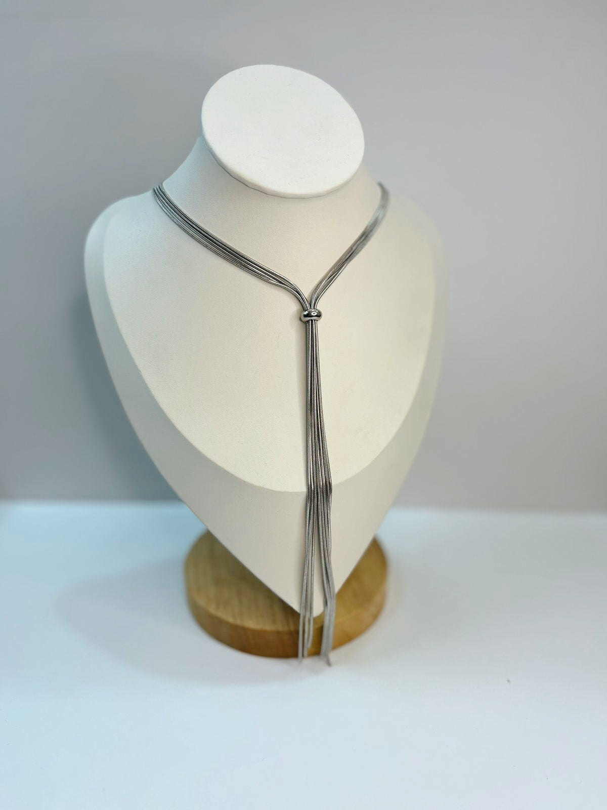 Corbatín lazos plateados