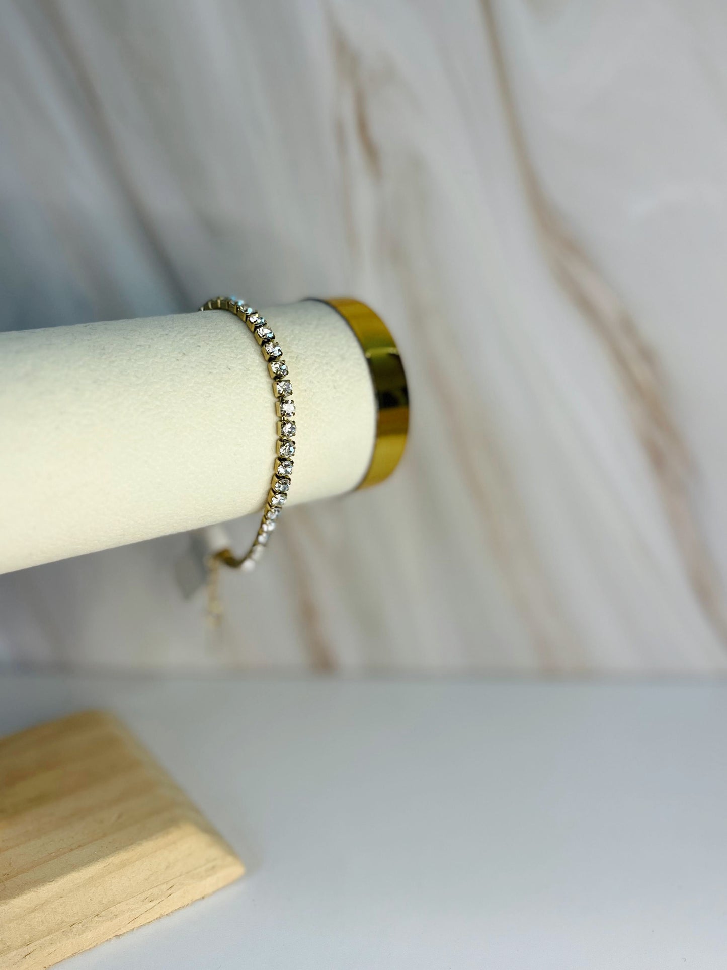 Pulsera tenis G dorada