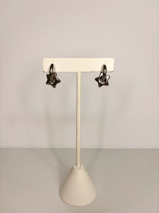 Arracadas estrellas plateadas